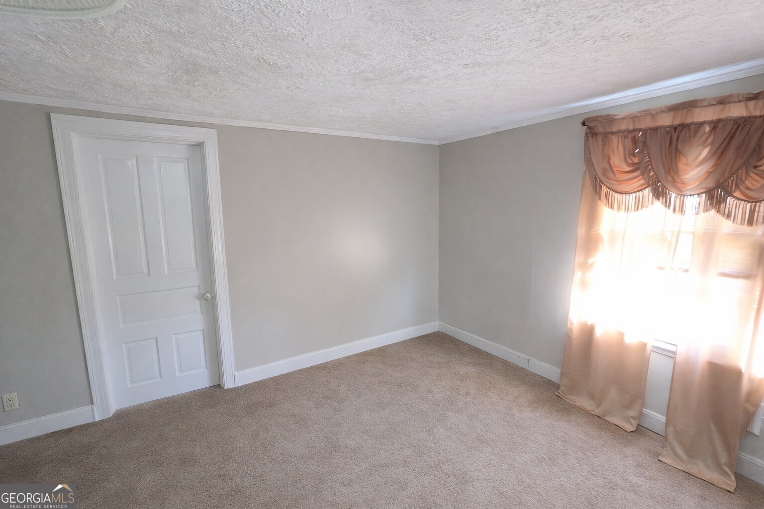 414 Wedowee Street Bowdon, GA 30108 - Photo 11 of 23 a view of an empty room and window