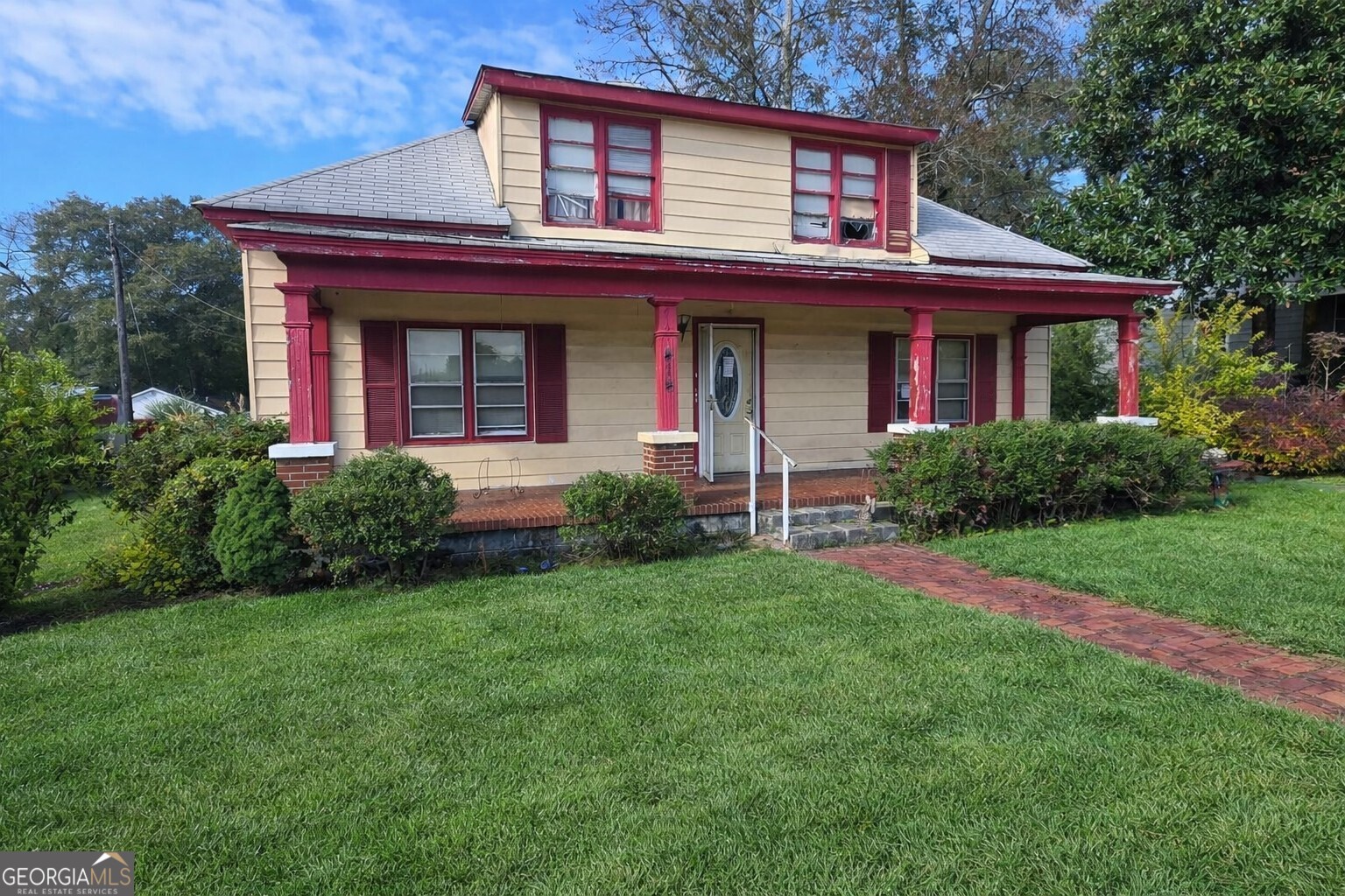 414 Wedowee Street Bowdon, GA 30108 - Photo 2 of 23 a front view of a house with a yard and porch