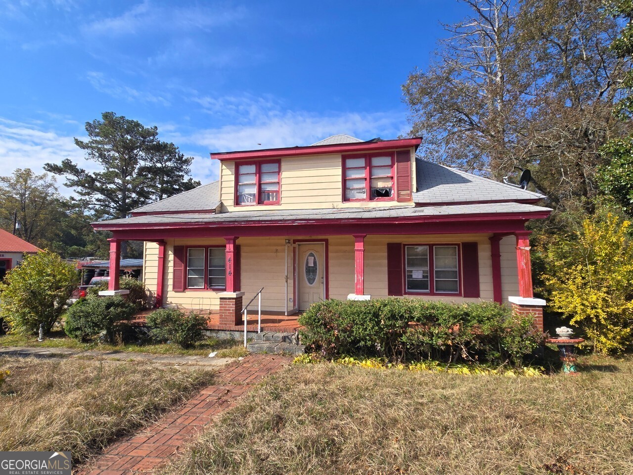 414 Wedowee Street Bowdon, GA 30108 - Photo 21 of 23 a front view of a house with garden