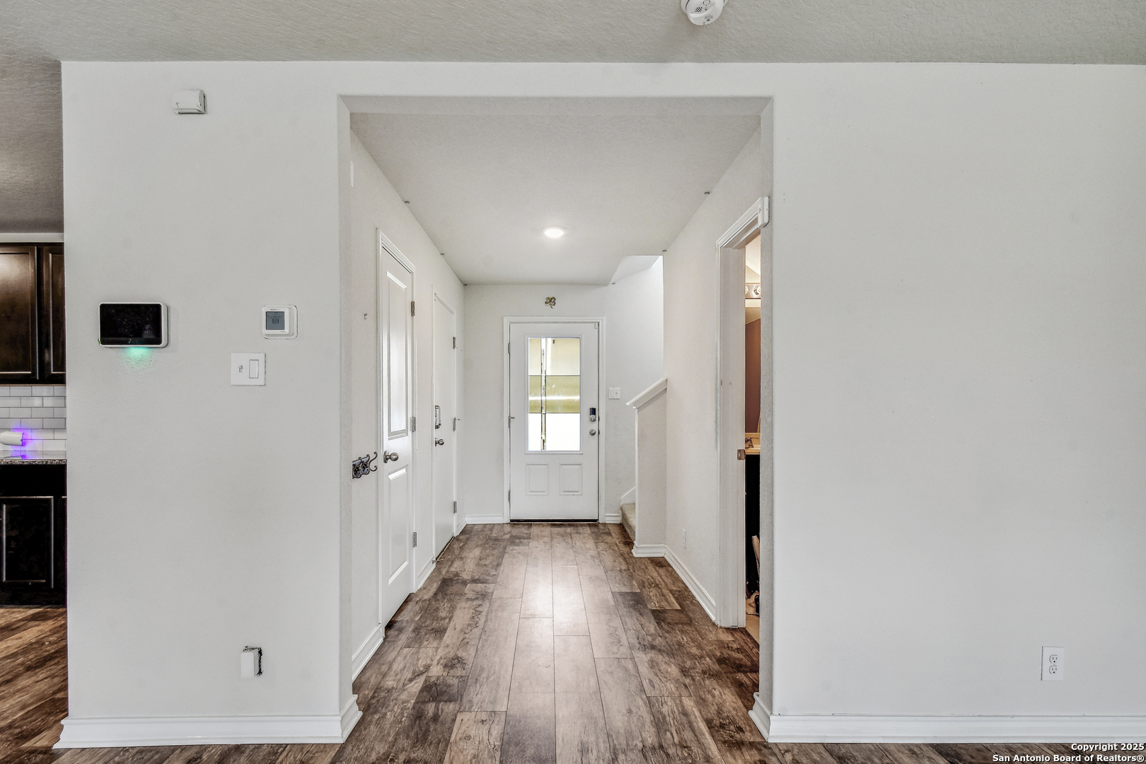 9627 Baytown Coast San Antonio, TX 78254 - Photo 12 of 22 a view of hallway with wooden floor