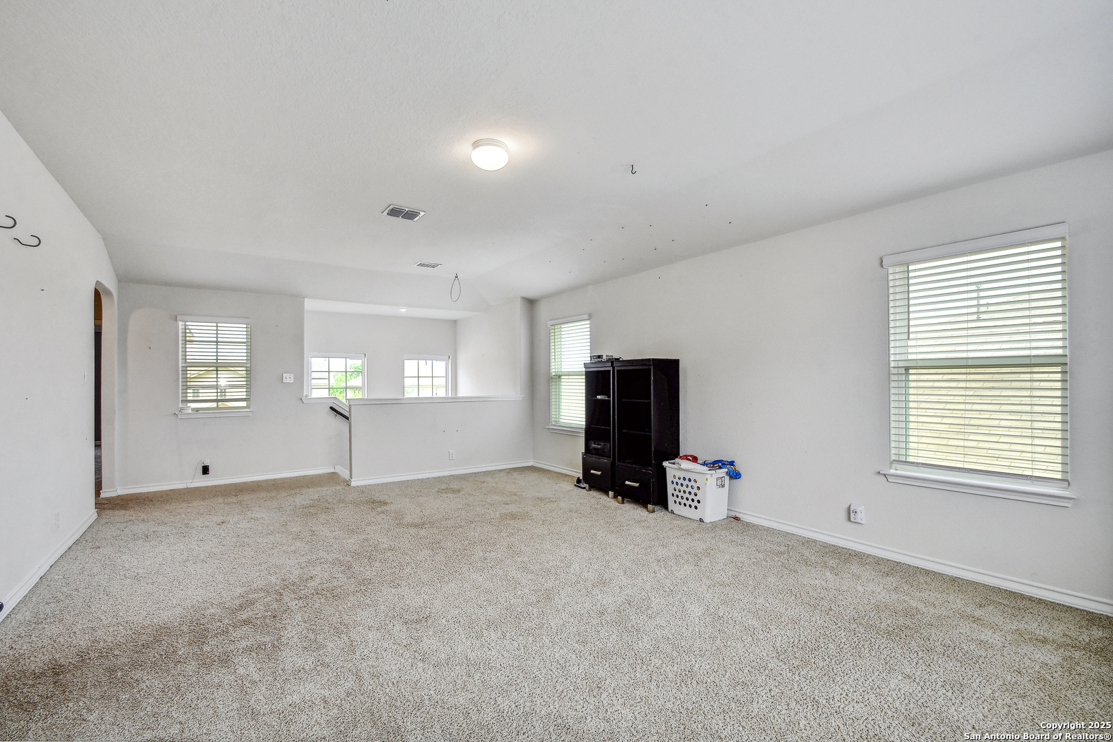 9627 Baytown Coast San Antonio, TX 78254 - Photo 15 of 22 a view of an empty room with a window