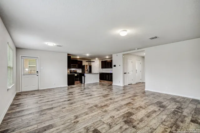 a view of a kitchen with a sink