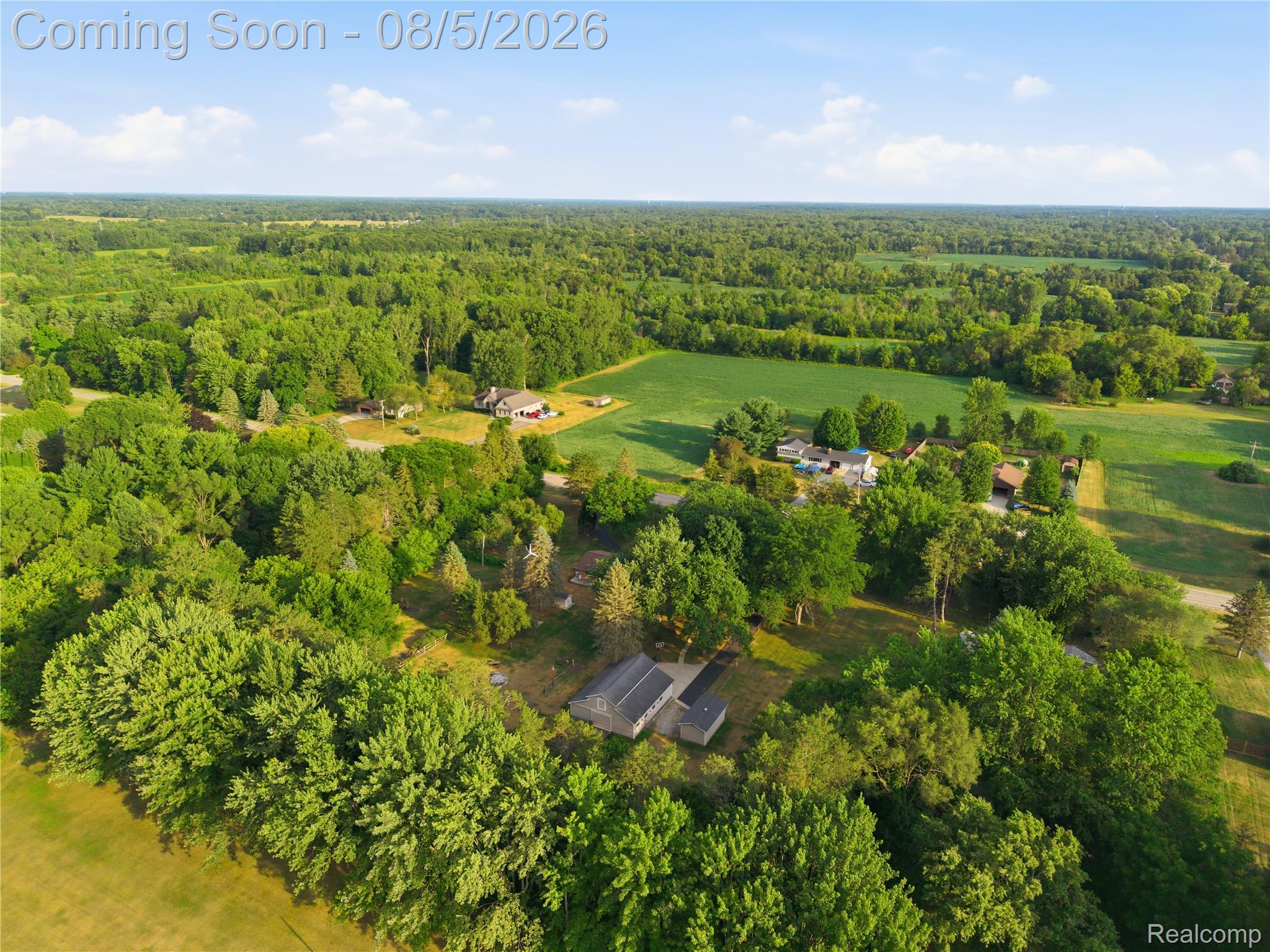6478 West Stanley Road Mount Morris, MI 48458 - Photo 79 of 80 Expansive aerial landscape featuring a mix of mature trees and open fields