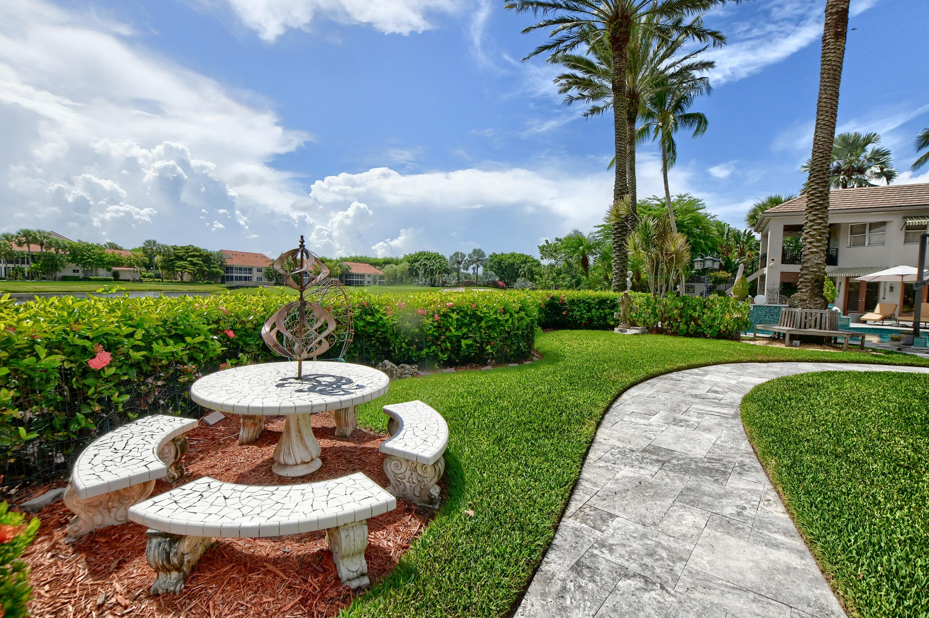 6187 Northwest 24th Terrace Boca Raton, FL 33496 - Photo 13 of 58 Side garden seating area