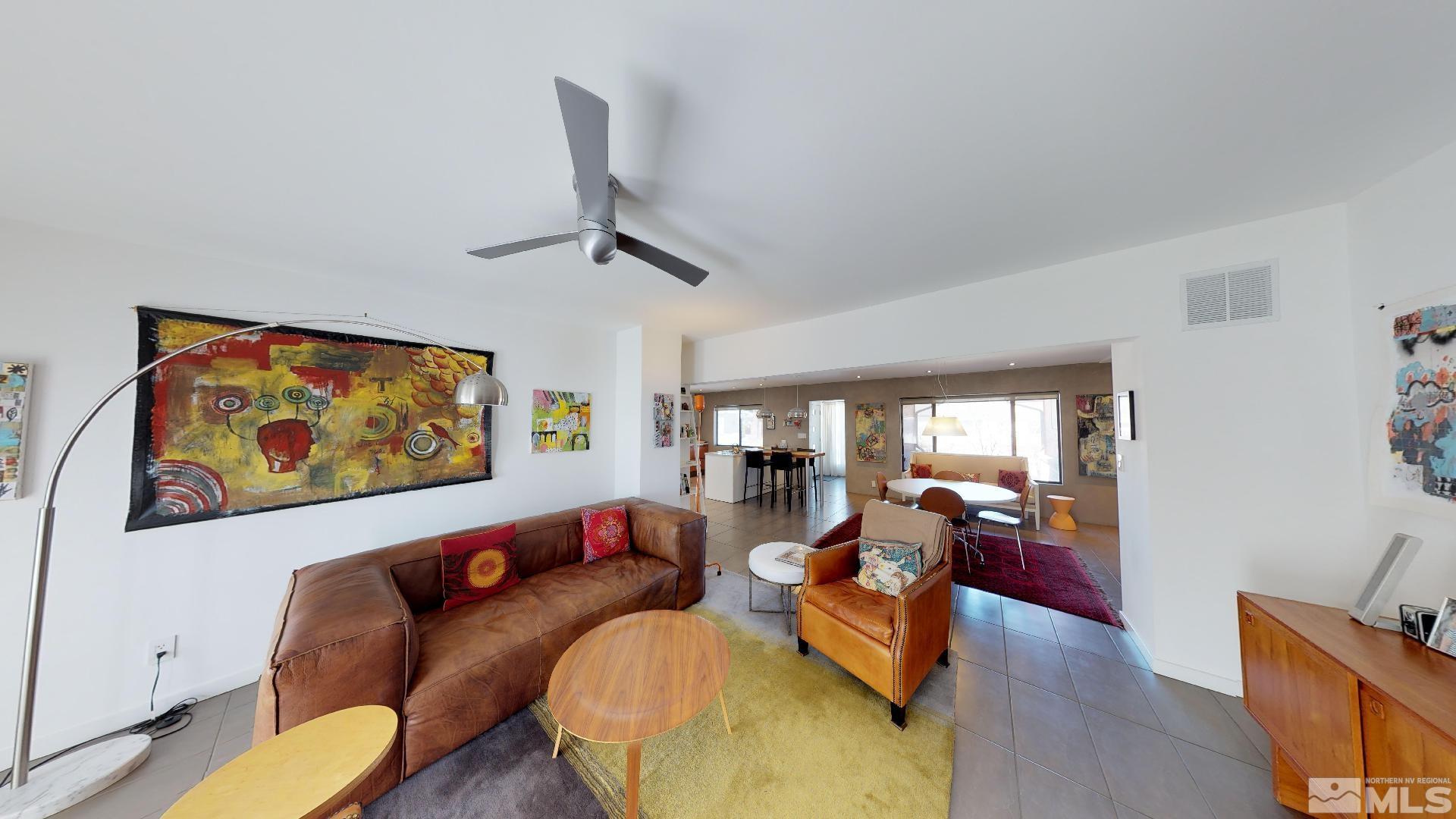 2160 Riviera Street Reno, NV 89509 - Photo 11 of 40 a living room with furniture and a flat screen tv