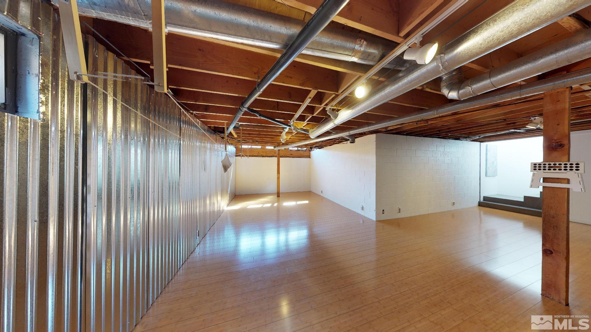 2160 Riviera Street Reno, NV 89509 - Photo 27 of 40 a view of empty room with wooden floor