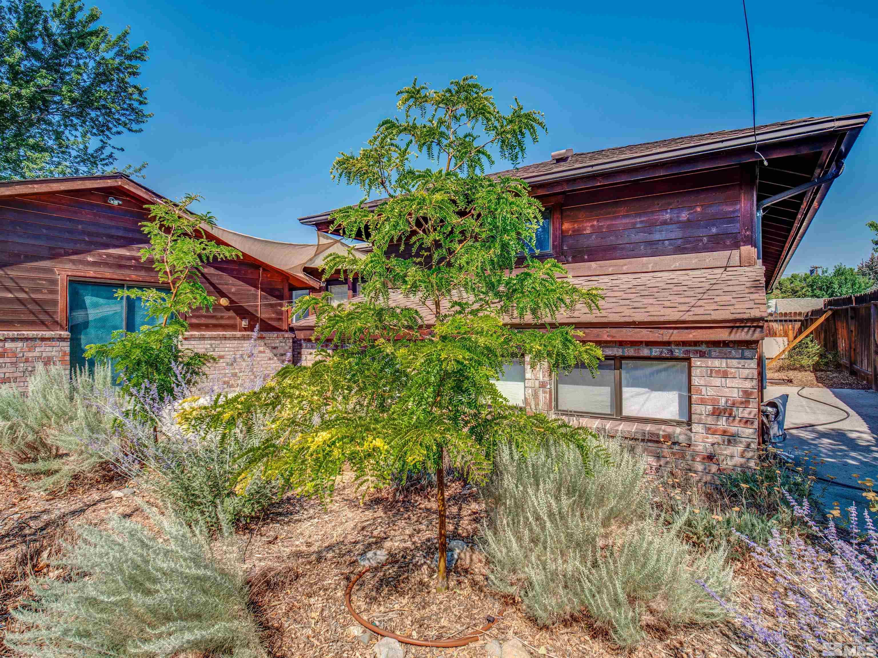 2160 Riviera Street Reno, NV 89509 - Photo 35 of 40 a house view with a garden space