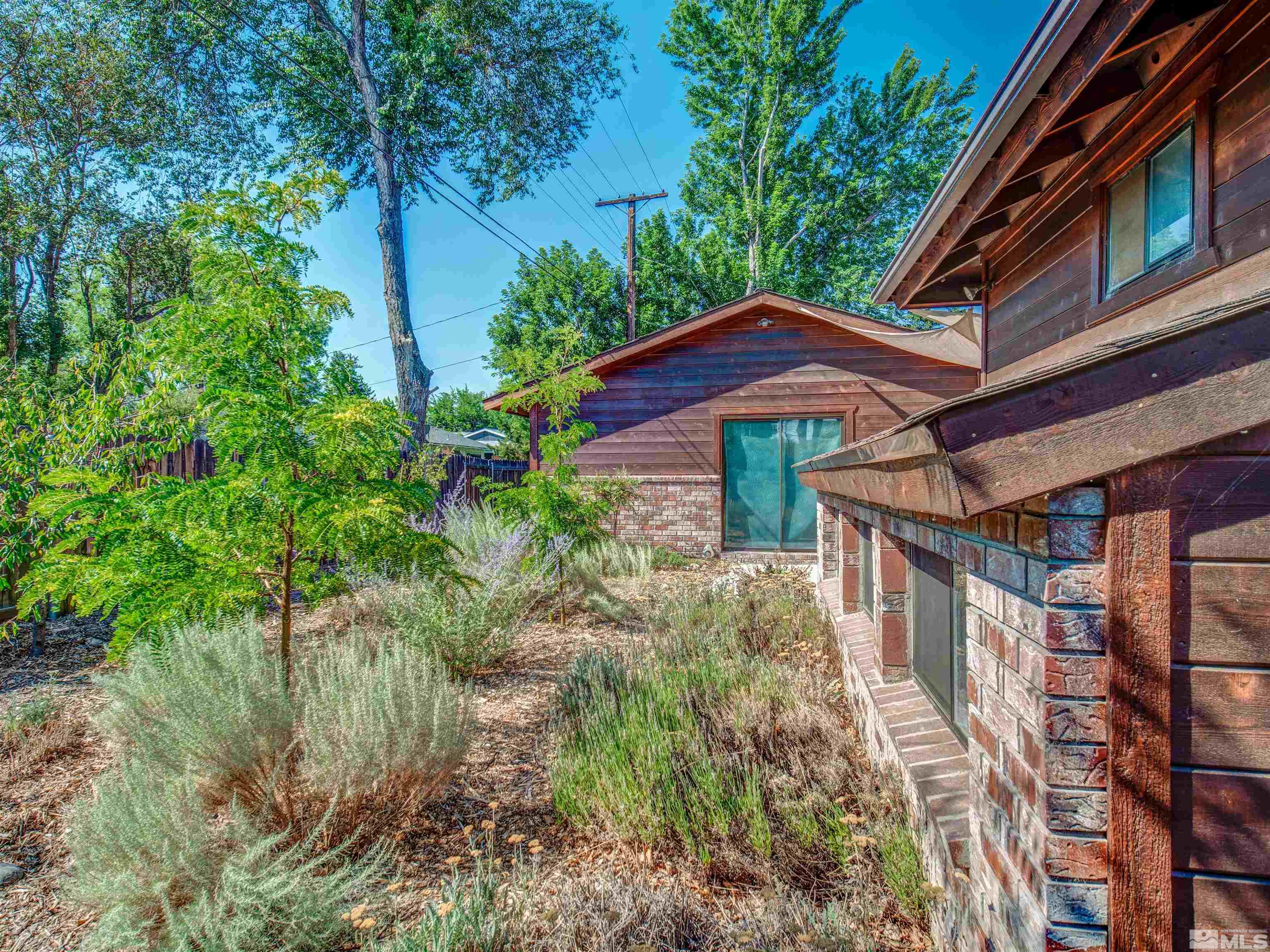 2160 Riviera Street Reno, NV 89509 - Photo 36 of 40 a view of a house with a yard balcony and wooden floor