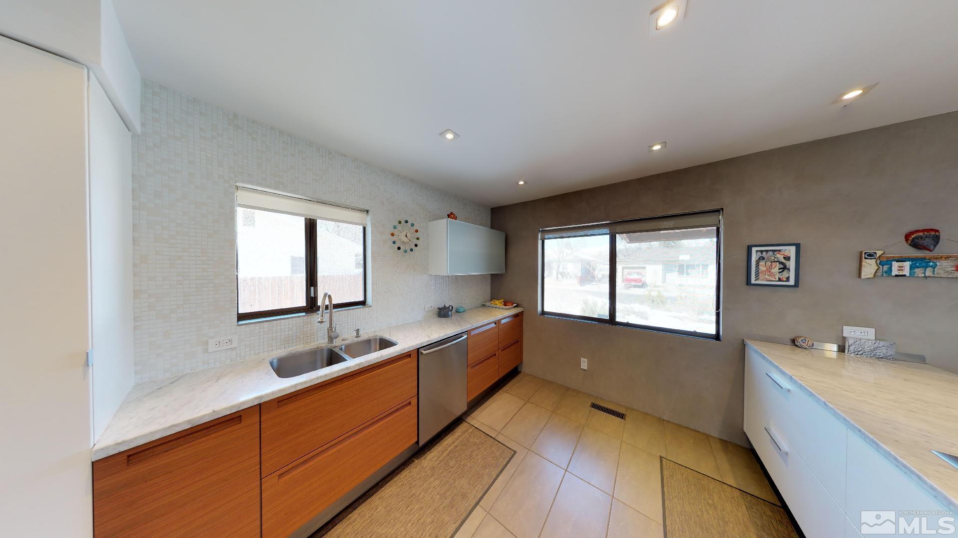 2160 Riviera Street Reno, NV 89509 - Photo 7 of 40 a large white kitchen with a large window