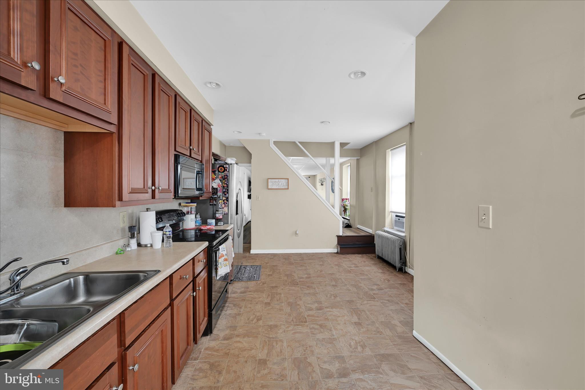 942 Pike Street Reading, PA 19604 - Photo 15 of 27 a kitchen that has a sink and cabinets