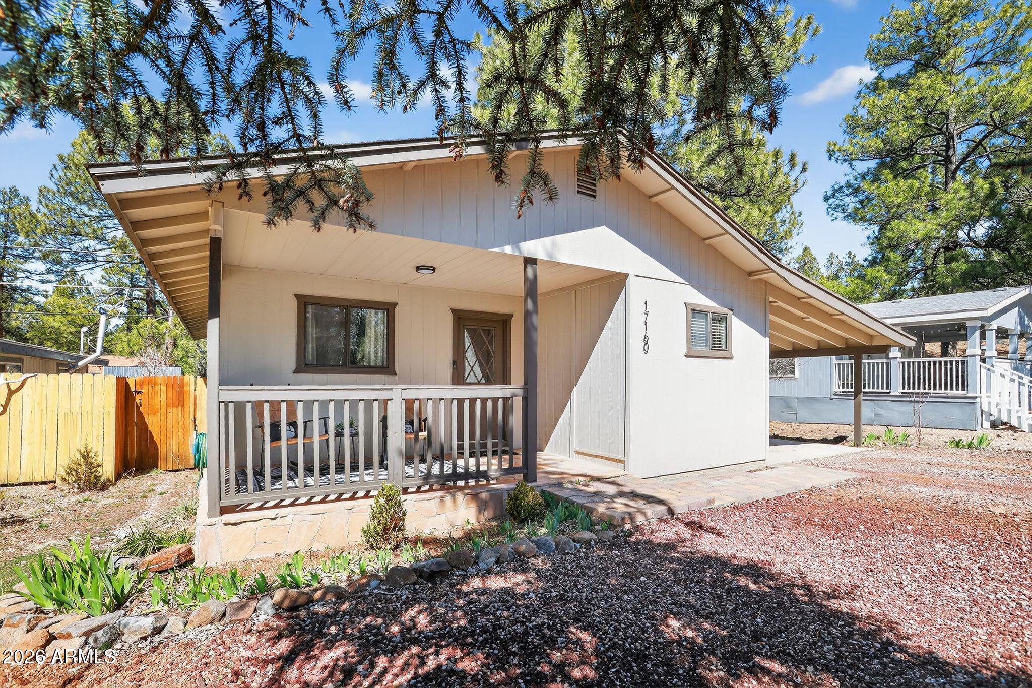 17160 Deer Run Road Munds Park, AZ 86017 - Photo 5 of 31 a view of a house with a yard