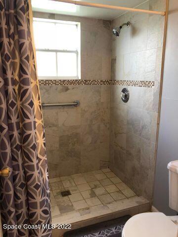 1324 Zanzibar Road Southeast Palm Bay, FL 32909 - Photo 14 of 18 a bathroom with a shower