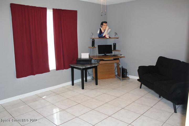1324 Zanzibar Road Southeast Palm Bay, FL 32909 - Photo 16 of 18 a workspace with furniture and window