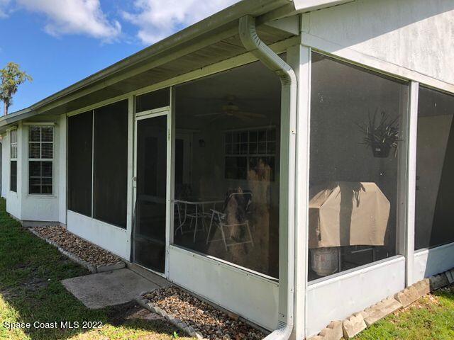1324 Zanzibar Road Southeast Palm Bay, FL 32909 - Photo 4 of 18 a view of a glass door of the house