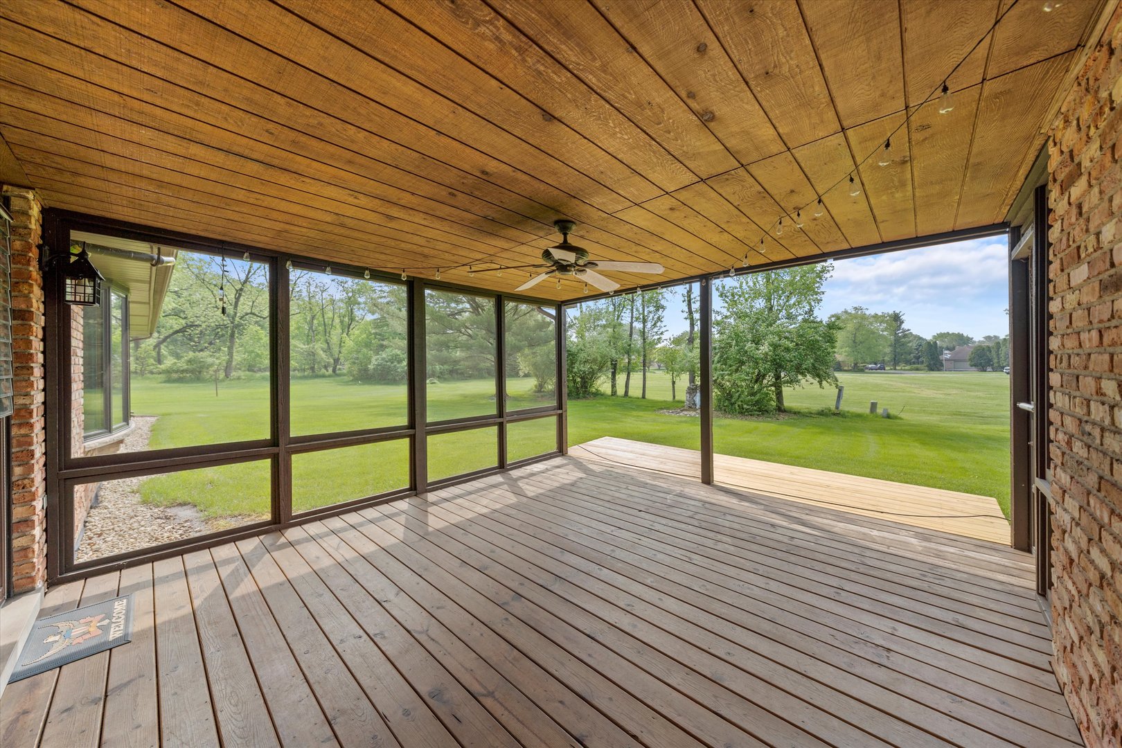 24449 South Klemme Road Crete, IL 60417 - Photo 18 of 21 a view of a deck with wooden floor and garden