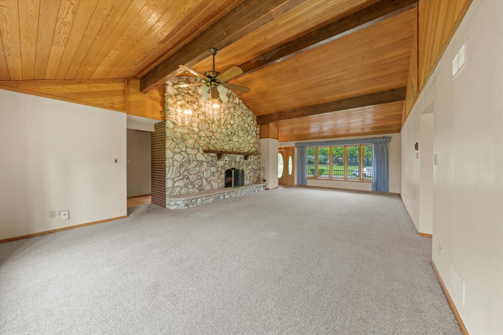 24449 South Klemme Road Crete, IL 60417 - Photo 3 of 21 a view of a room with a fireplace and a window