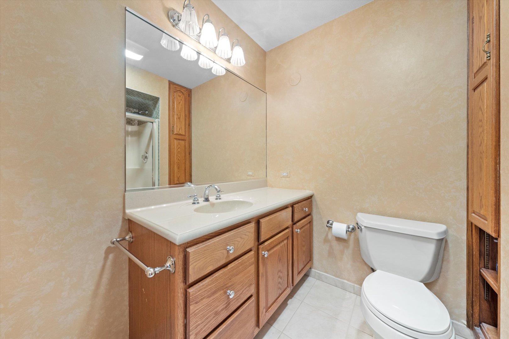 24449 South Klemme Road Crete, IL 60417 - Photo 6 of 21 a bathroom with a toilet sink and mirror