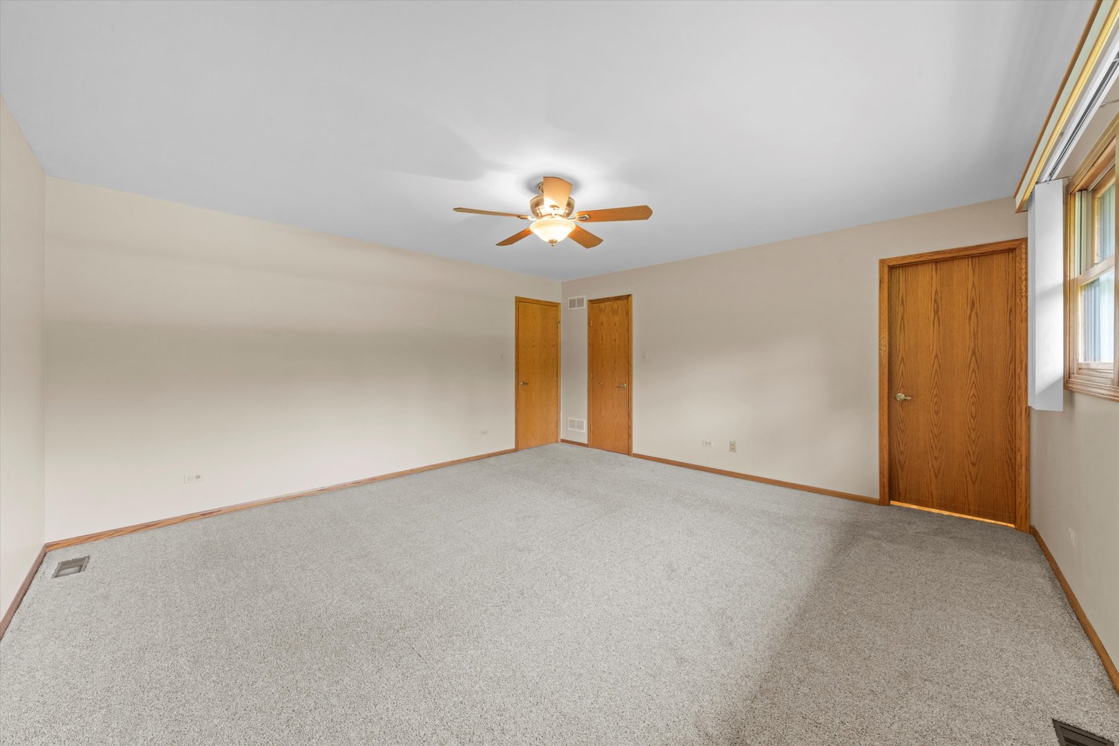 24449 South Klemme Road Crete, IL 60417 - Photo 9 of 21 a view of a room with a ceiling fan and window