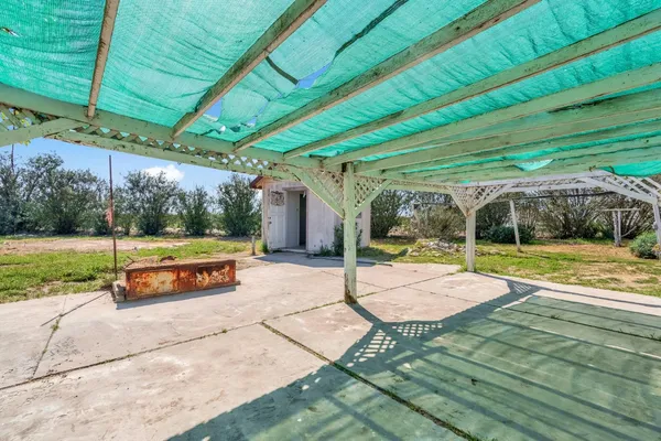 a view of a house with entertaining space