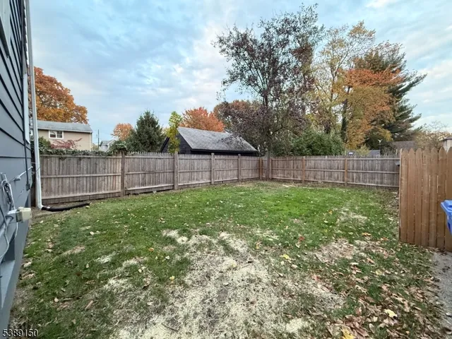 a view of a backyard with a garden