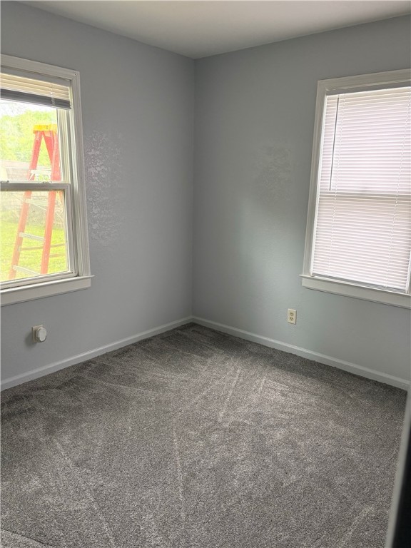 3060 Hickory Street Decatur, IL 62526 - Photo 8 of 13 an empty room with a window