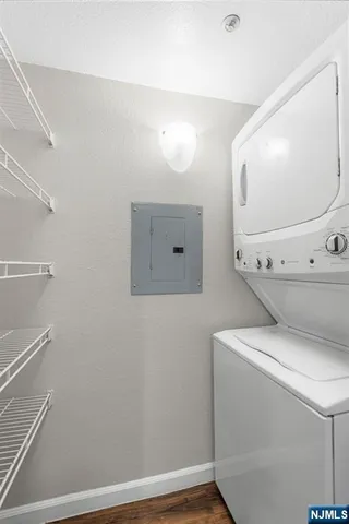 a bathroom with a toilet and a mirror