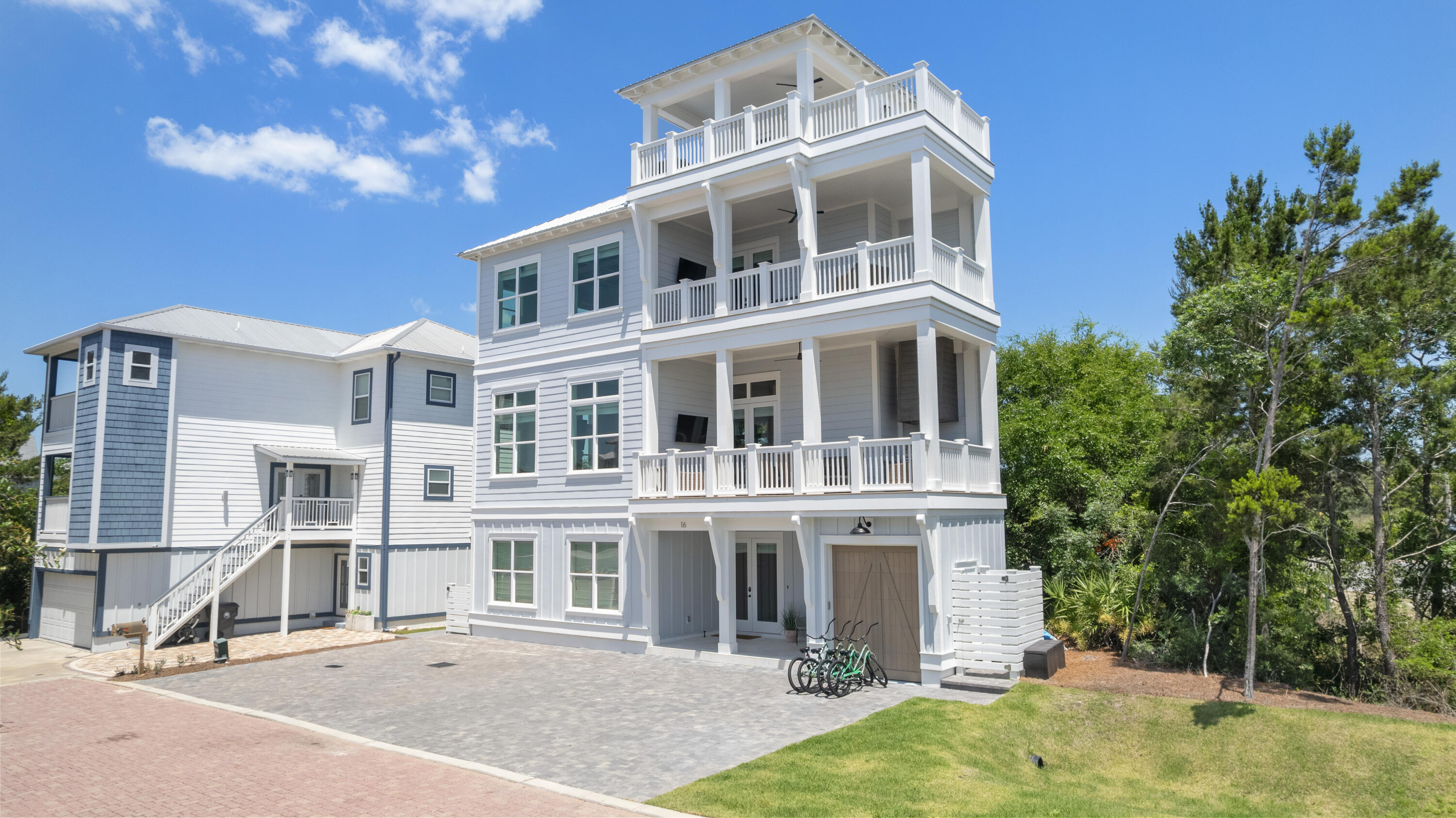 16 Bluewater View Ave Inlet Beach Inlet Beach, FL 32461 - Photo 2 of 59 a front view of a house with a yard