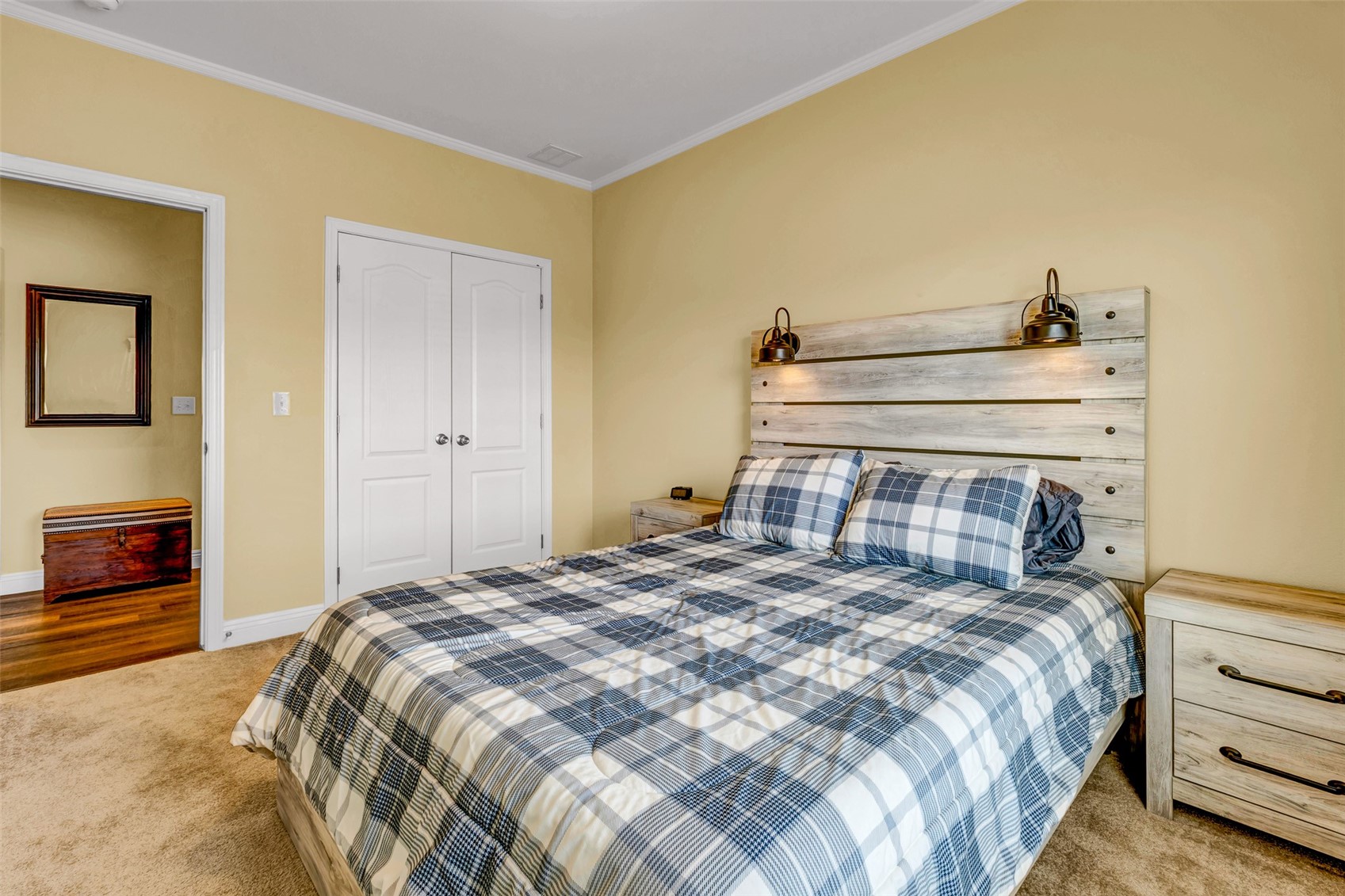 108 A Sun Rock Road, Unit A Fairplay, CO 80440 - Photo 34 of 48 a bedroom with a bed and a flat tv screen on dresser