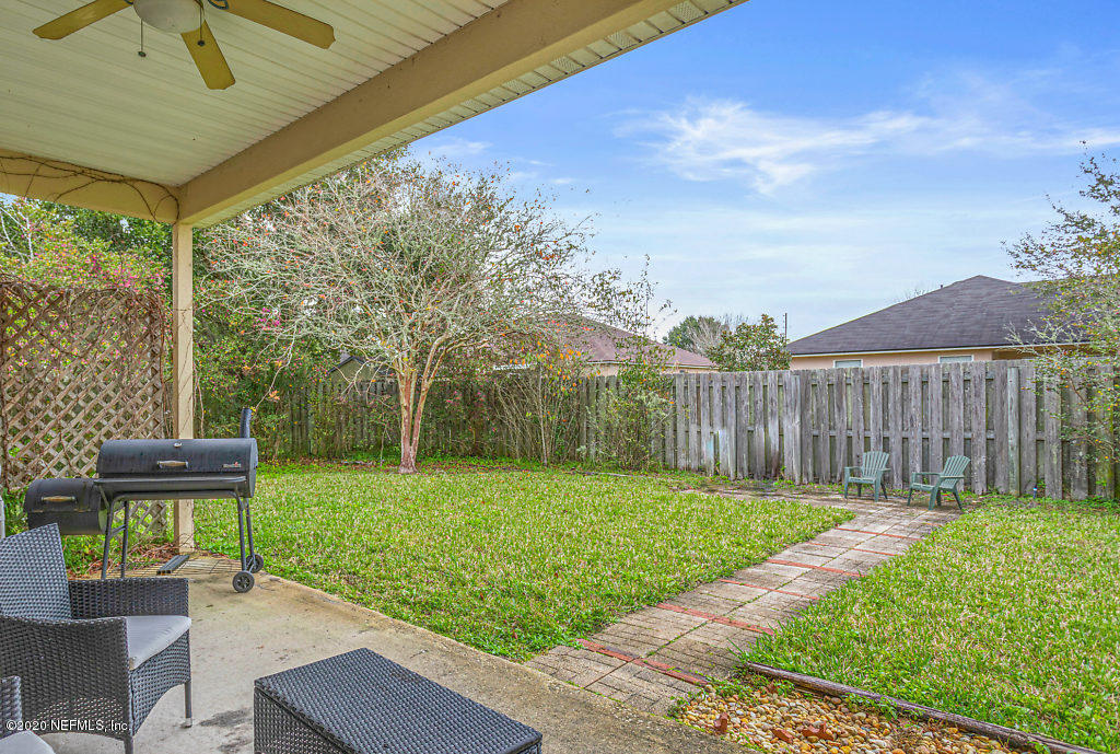 2443 Paris Mill Road Jacksonville, FL 32221 - Photo 30 of 33 a garden view with a seating space