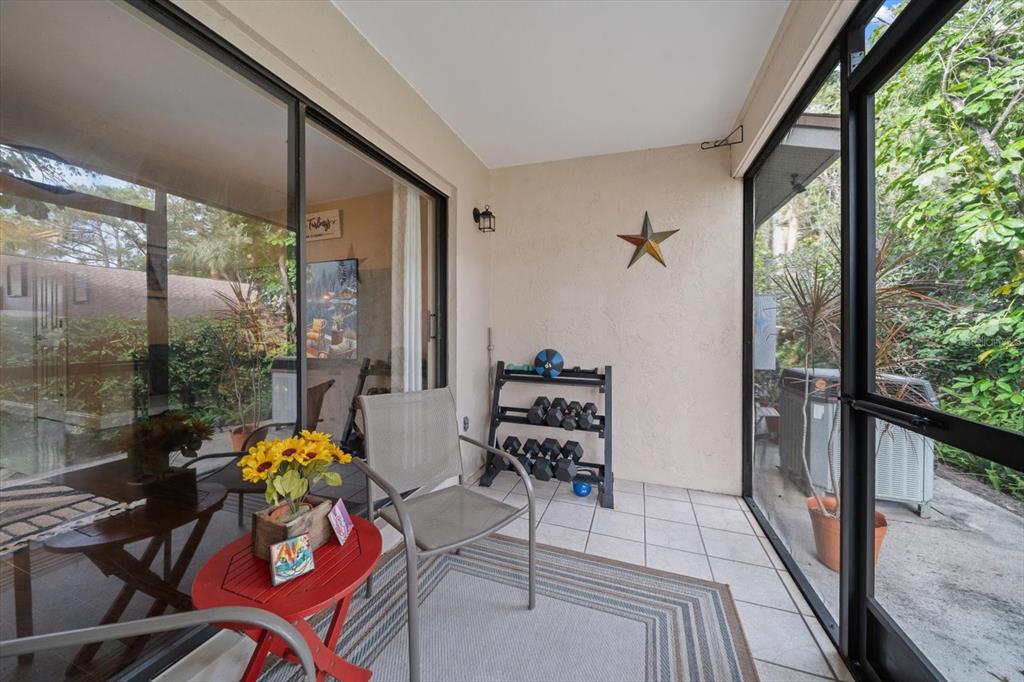 2131 Ridge Road South, Unit 75 Largo, FL 33778 - Photo 14 of 32 a outdoor space with chairs