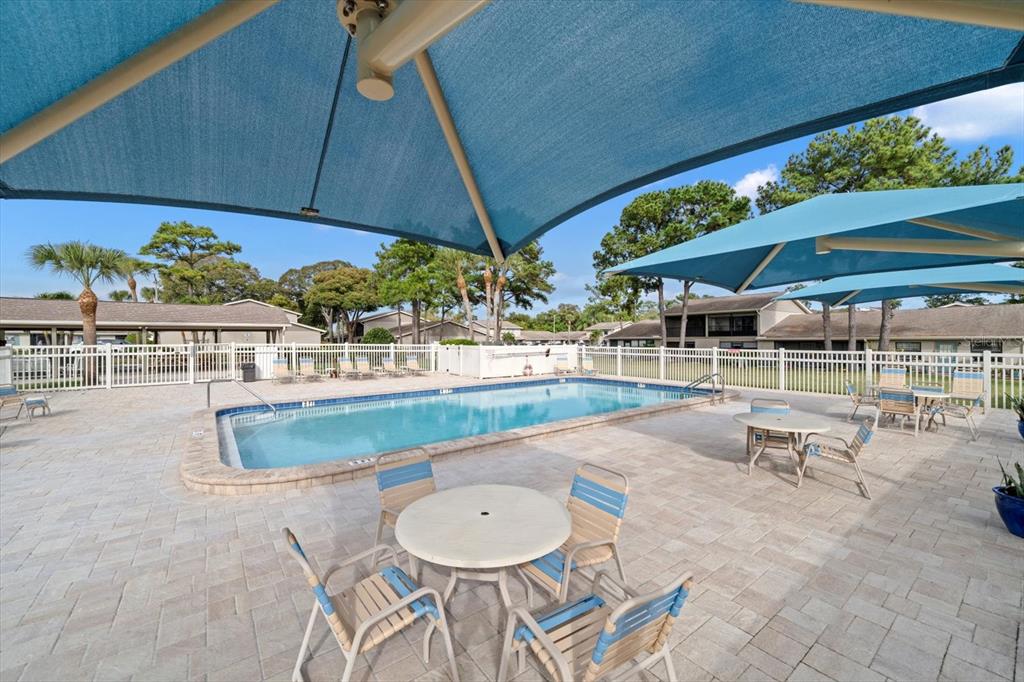 2131 Ridge Road South, Unit 75 Largo, FL 33778 - Photo 27 of 32 a outdoor view with a sitting space
