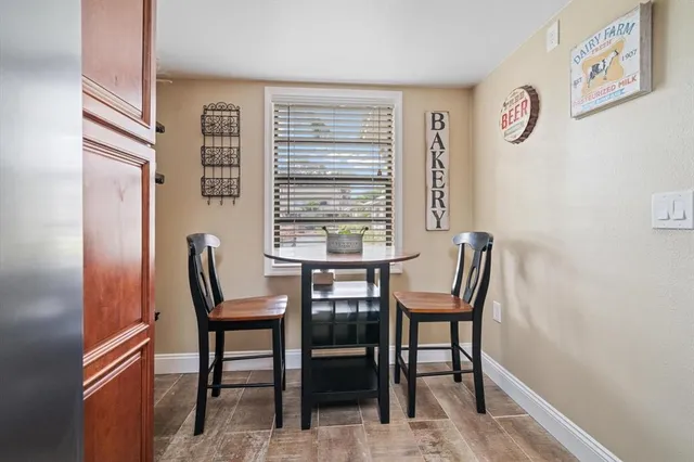 a view of a room with furniture window and wooden floor