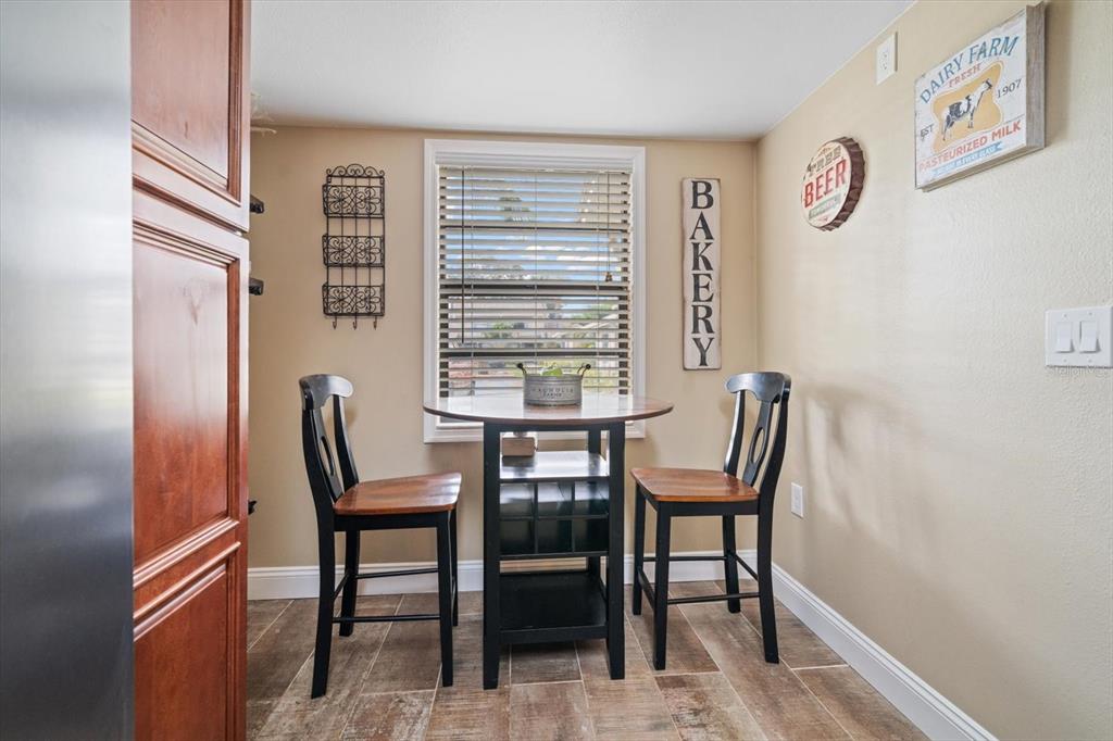 2131 Ridge Road South, Unit 75 Largo, FL 33778 - Photo 6 of 32 a view of a room with furniture window and wooden floor