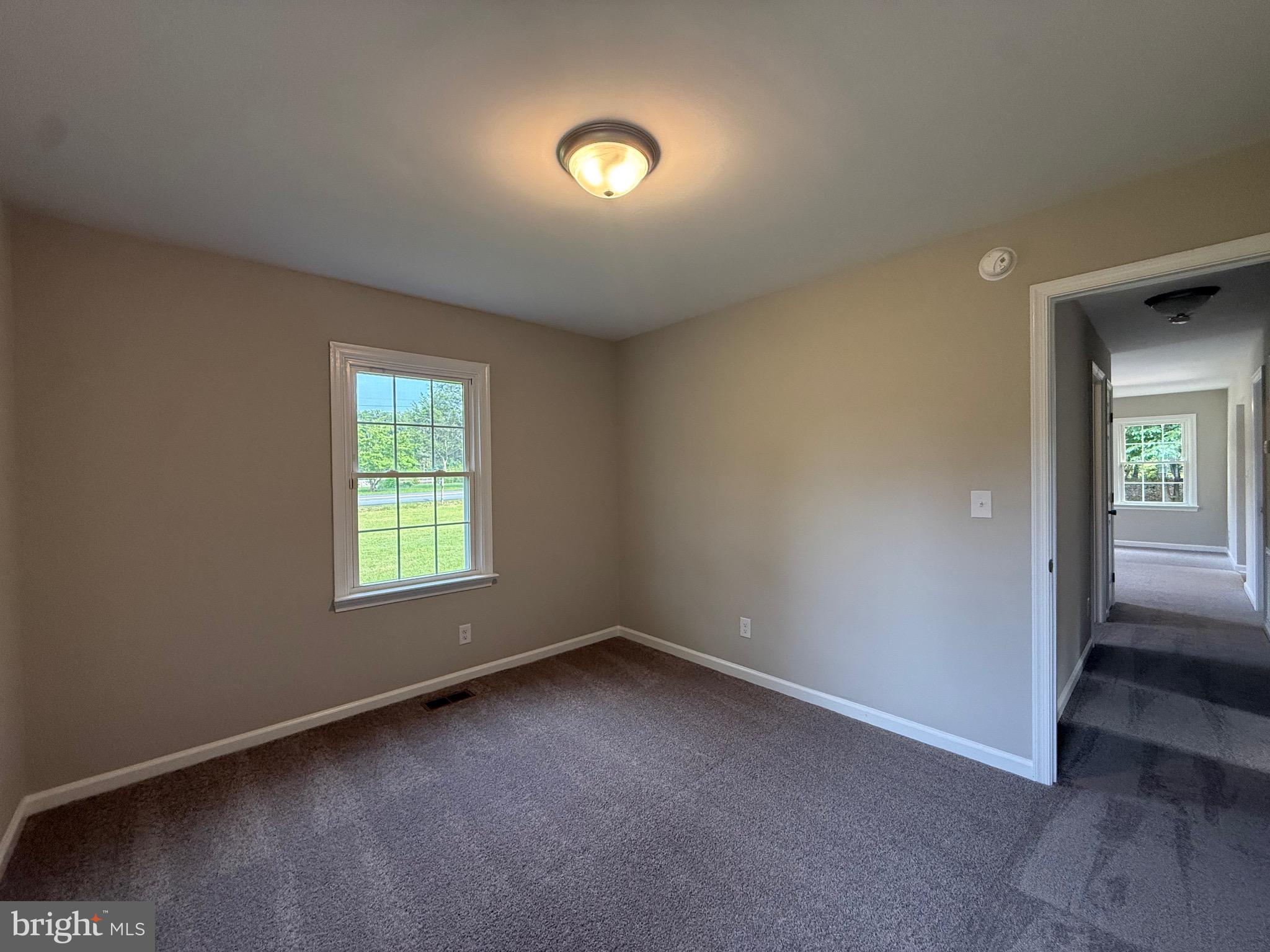 319 Chopping Road Mineral, VA 23117 - Photo 16 of 22 an empty room with a window