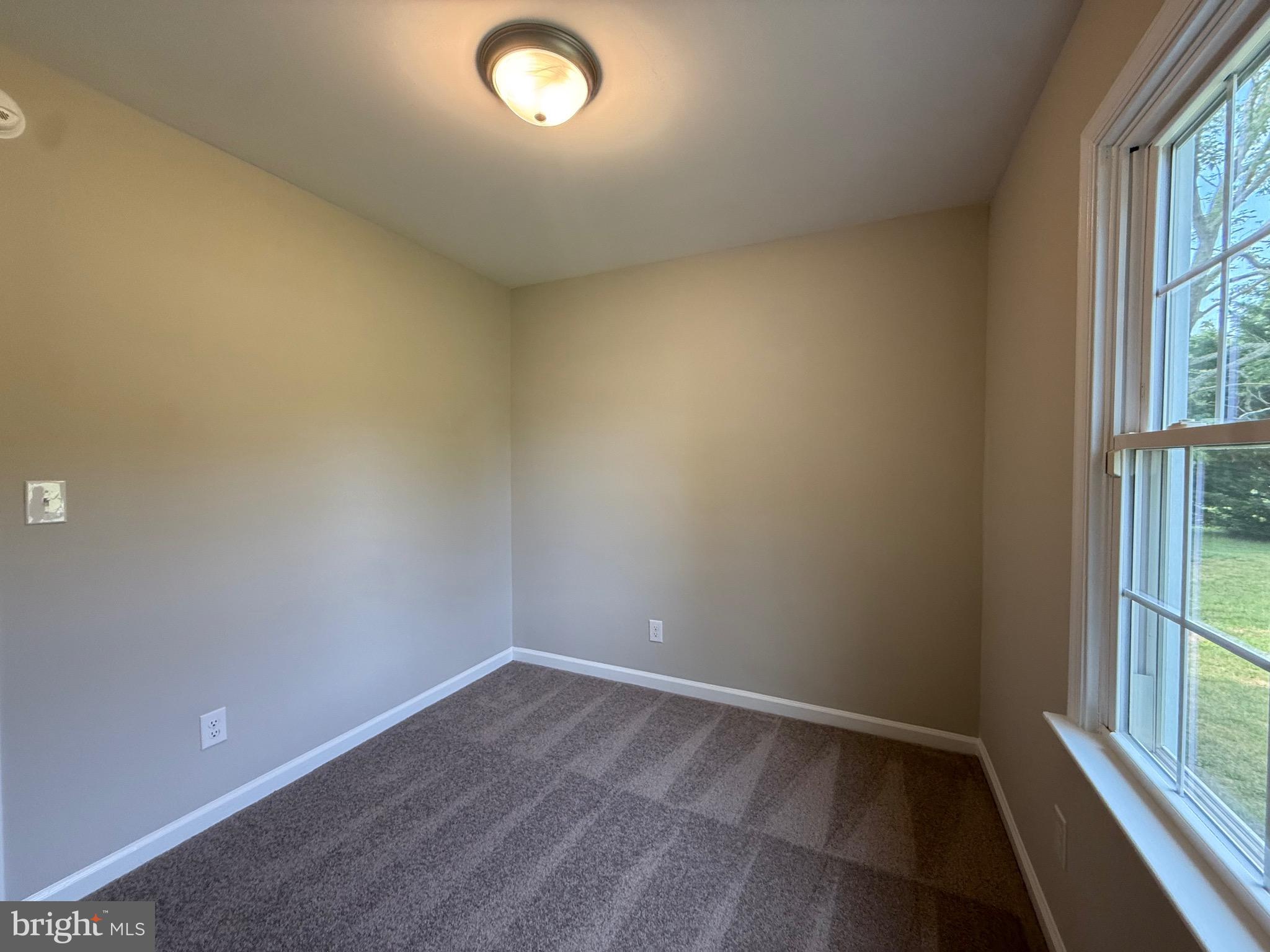 319 Chopping Road Mineral, VA 23117 - Photo 19 of 22 an empty room with windows