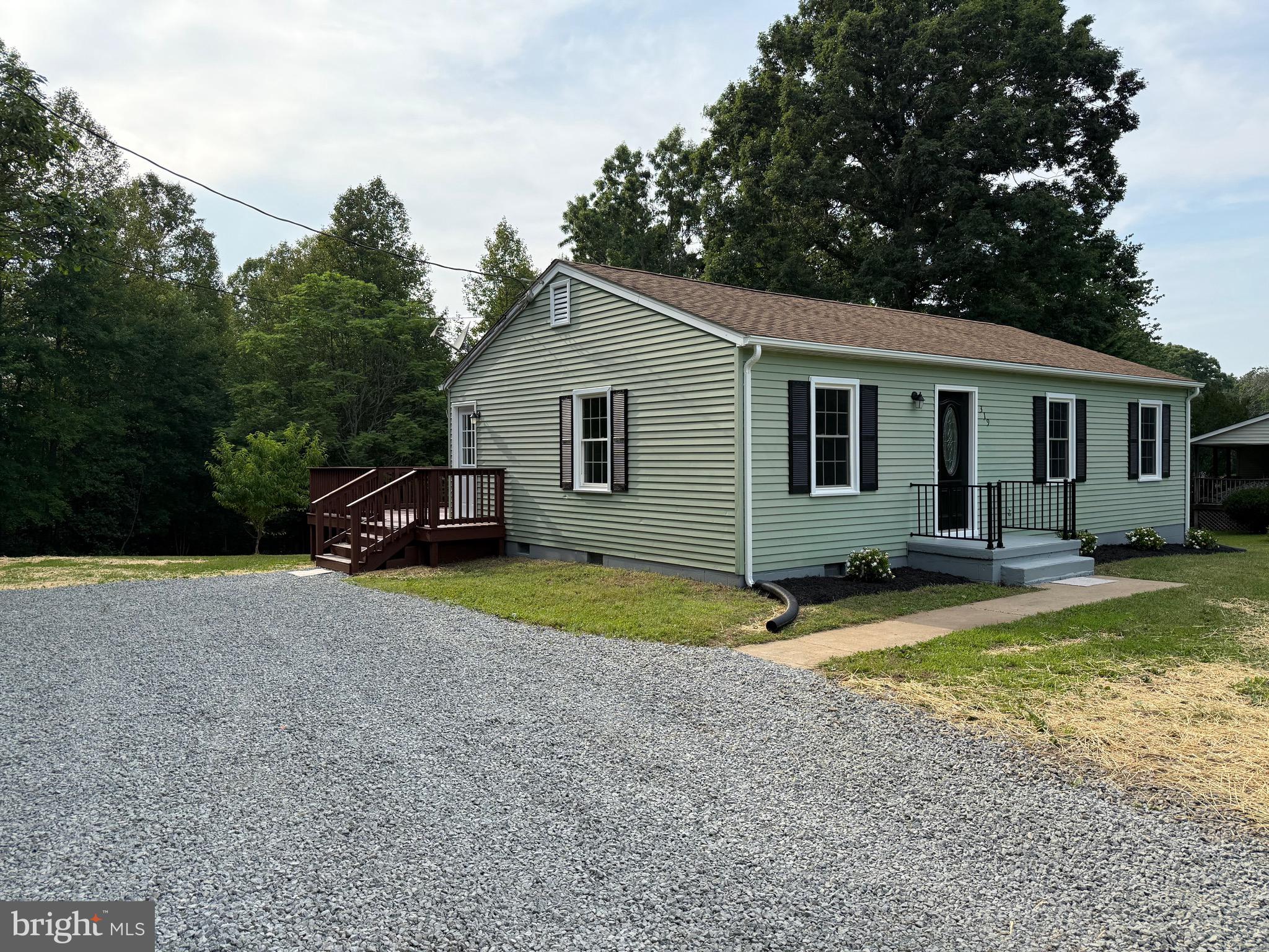 319 Chopping Road Mineral, VA 23117 - Photo 2 of 22 a view of a house with backyard and trees