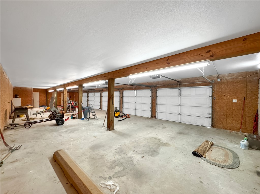 2977 Jurica Road Corpus Christi, TX 78415 - Photo 17 of 40 a view of a livingroom with furniture and white walls