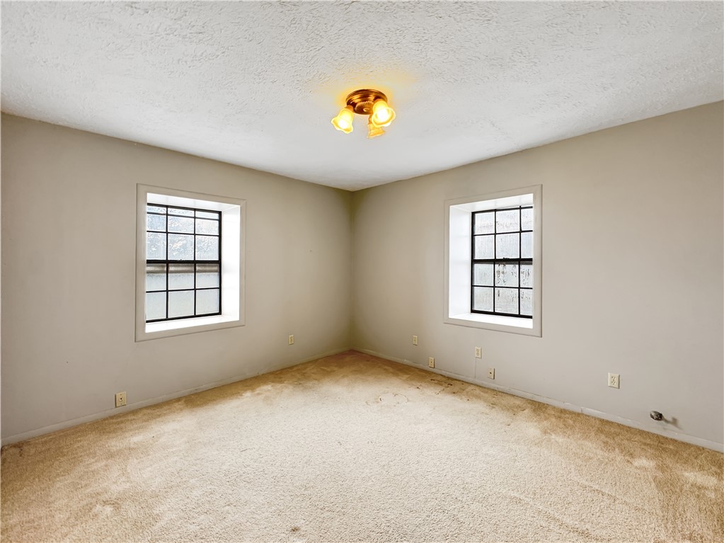 2977 Jurica Road Corpus Christi, TX 78415 - Photo 33 of 40 a view of an empty room with a window