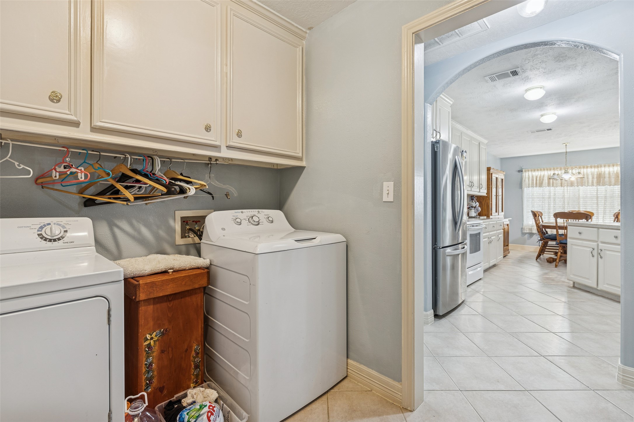 21 Pine Prairie School Road Huntsville, TX 77320 - Photo 14 of 26 a view of a storage & utility room with washer and dryer