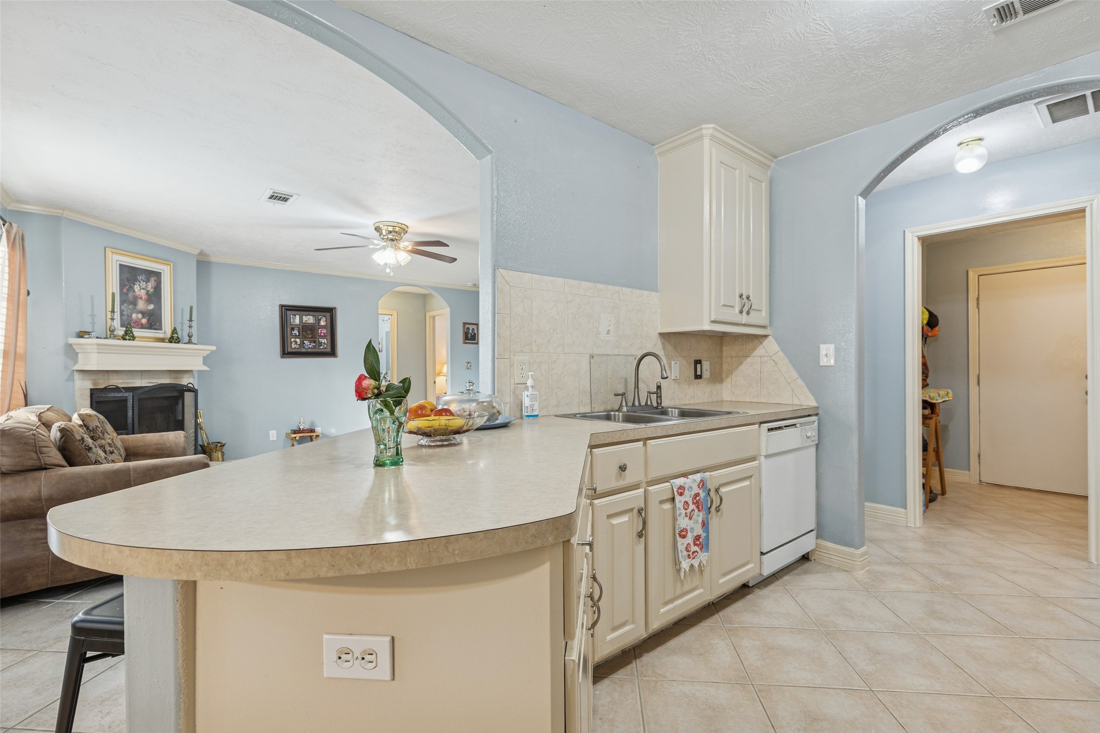 21 Pine Prairie School Road Huntsville, TX 77320 - Photo 9 of 26 a kitchen with stainless steel appliances granite countertop a sink stove and refrigerator