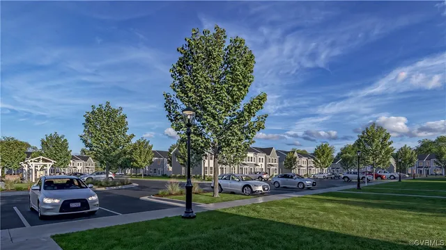 a view of a cars parked in front of a house