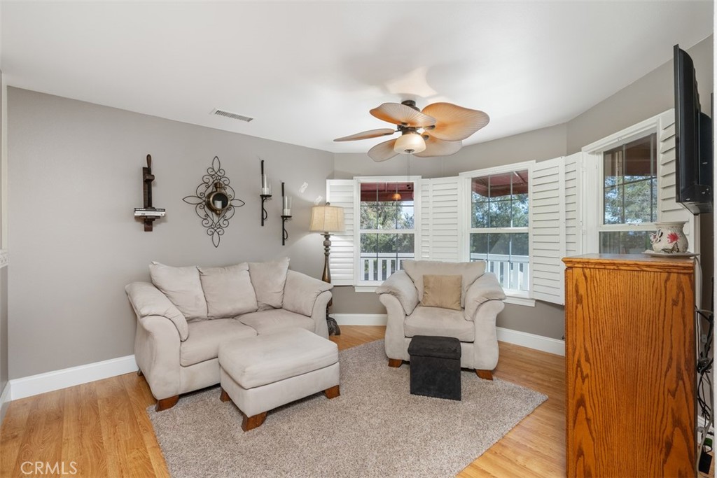 39460 Hilt Road Temecula, CA 92591 - Photo 17 of 74 a living room with furniture and a large window