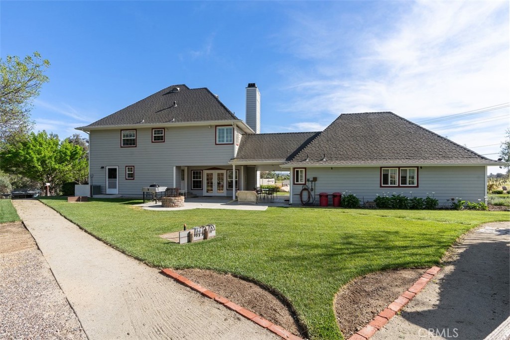 39460 Hilt Road Temecula, CA 92591 - Photo 46 of 74 a front view of a house with garden