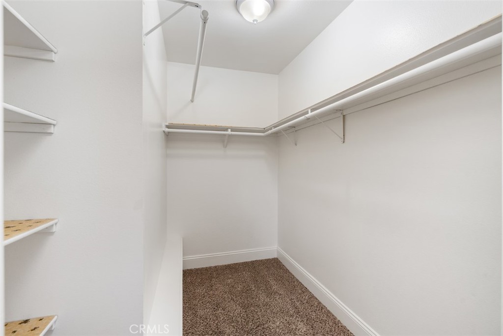 39460 Hilt Road Temecula, CA 92591 - Photo 63 of 74 a view of an empty walk in closet