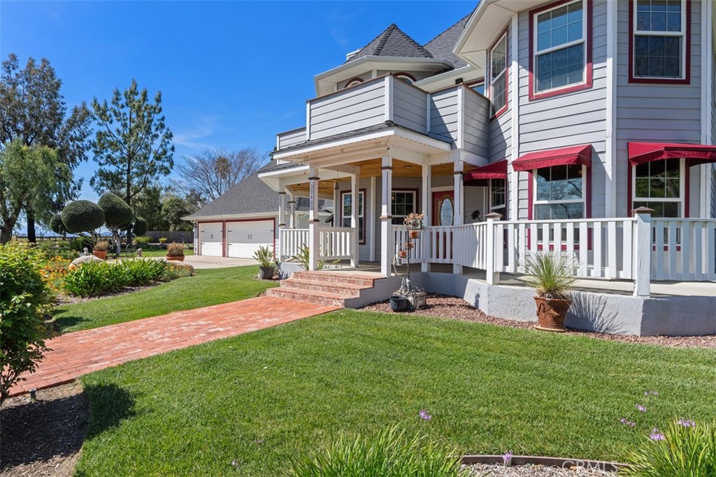 39460 Hilt Road Temecula, CA 92591 - Photo 9 of 74 a view of a house with a yard and sitting area