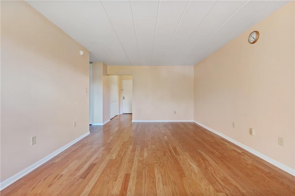 5 Bayard Road, Unit 221 Pittsburgh, PA 15213 - Photo 7 of 20 a view of a room with wooden floor and white walls