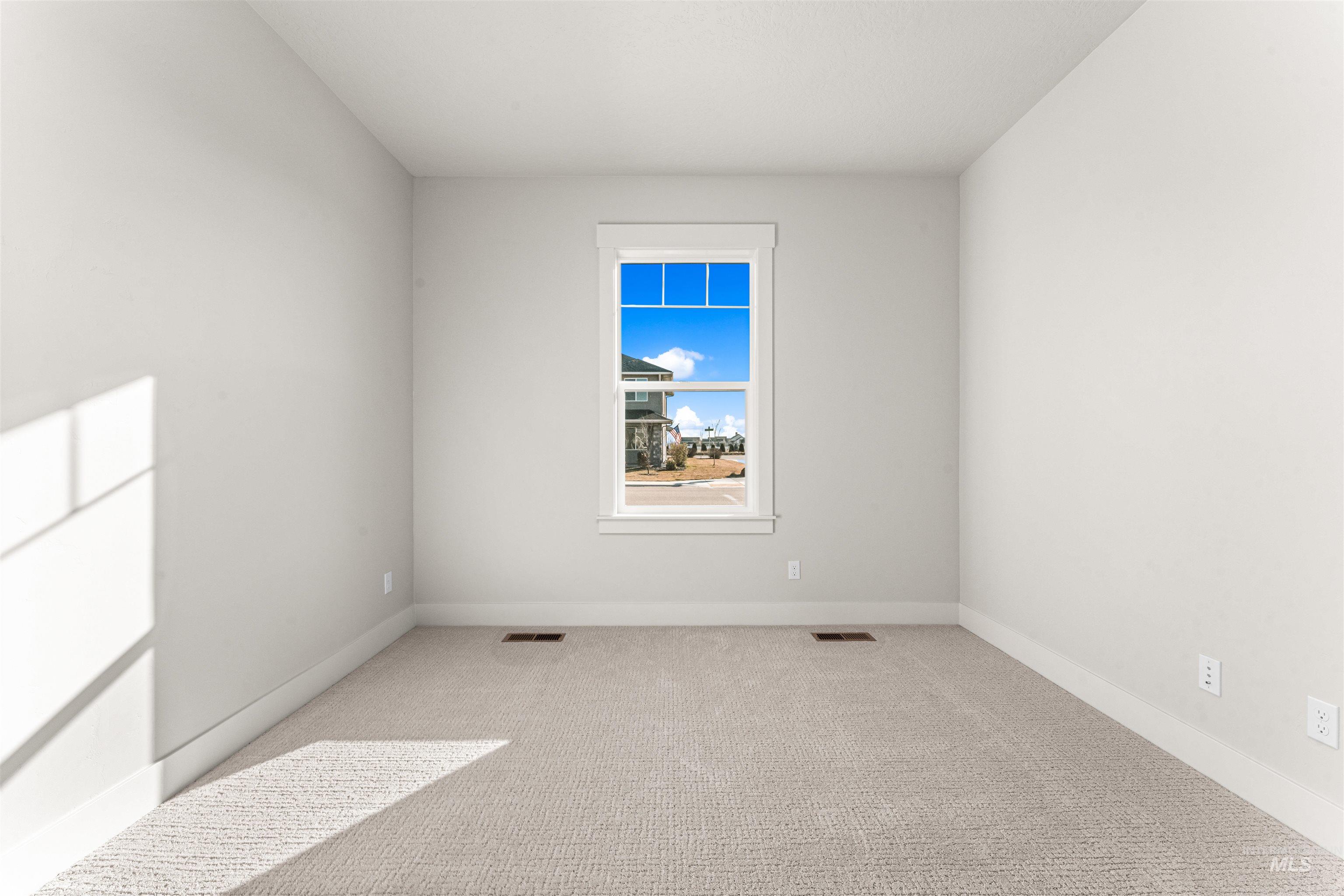8080 Tandy Cv Street Middleton, ID 83644 - Photo 24 of 35 Spare room with carpet floors and baseboards