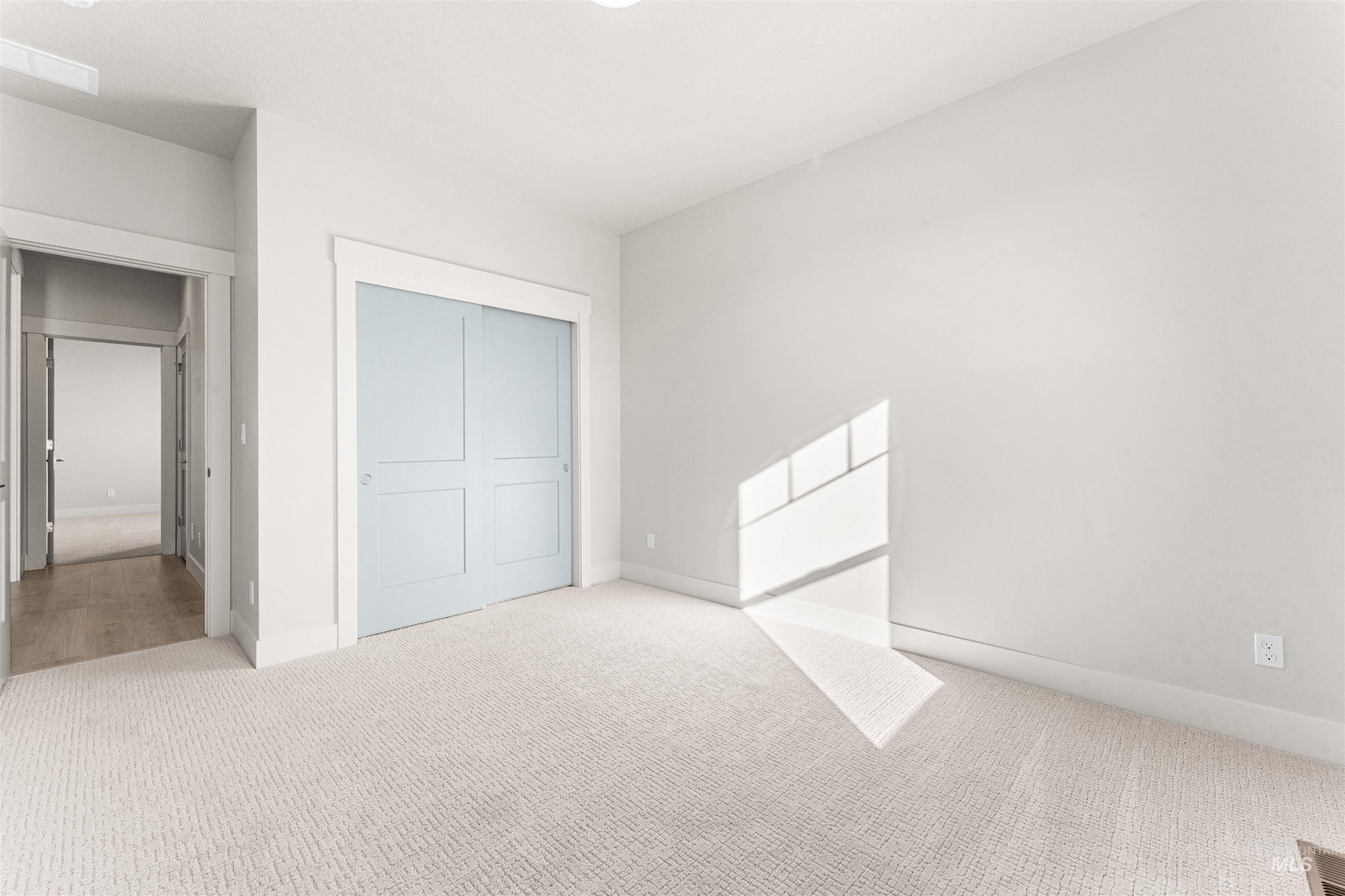 8080 Tandy Cv Street Middleton, ID 83644 - Photo 25 of 35 Unfurnished bedroom with carpet floors and a closet