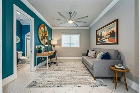 a living room with furniture and a window