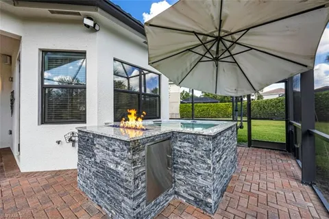 a view of swimming pool with a patio